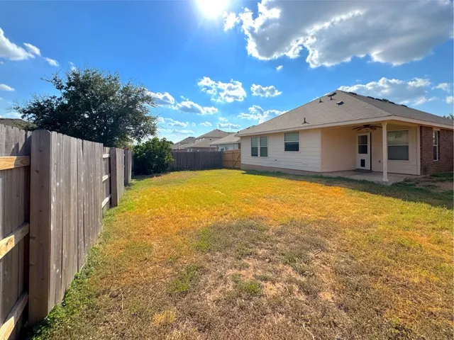 a view of a house with a swimming pool