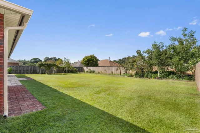 a view of a golf course with a lake