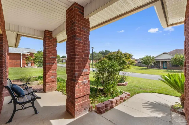 a view of an entryway with kitchen