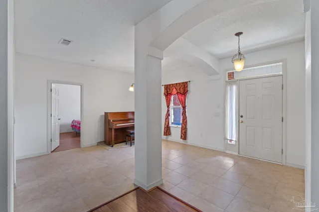 a view of a livingroom with furniture