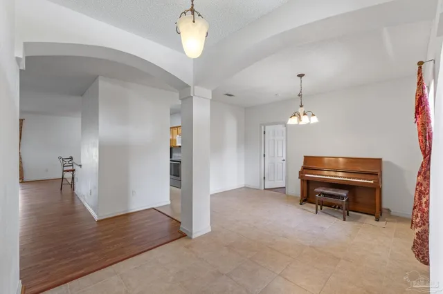 a room with furniture and a chandelier