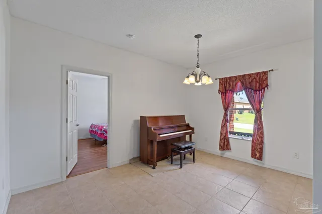a view of a living room and entryway