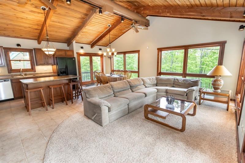 2226 County Line Road Champion, PA 15622 - Photo 9 of 33 a living room with furniture and a large window