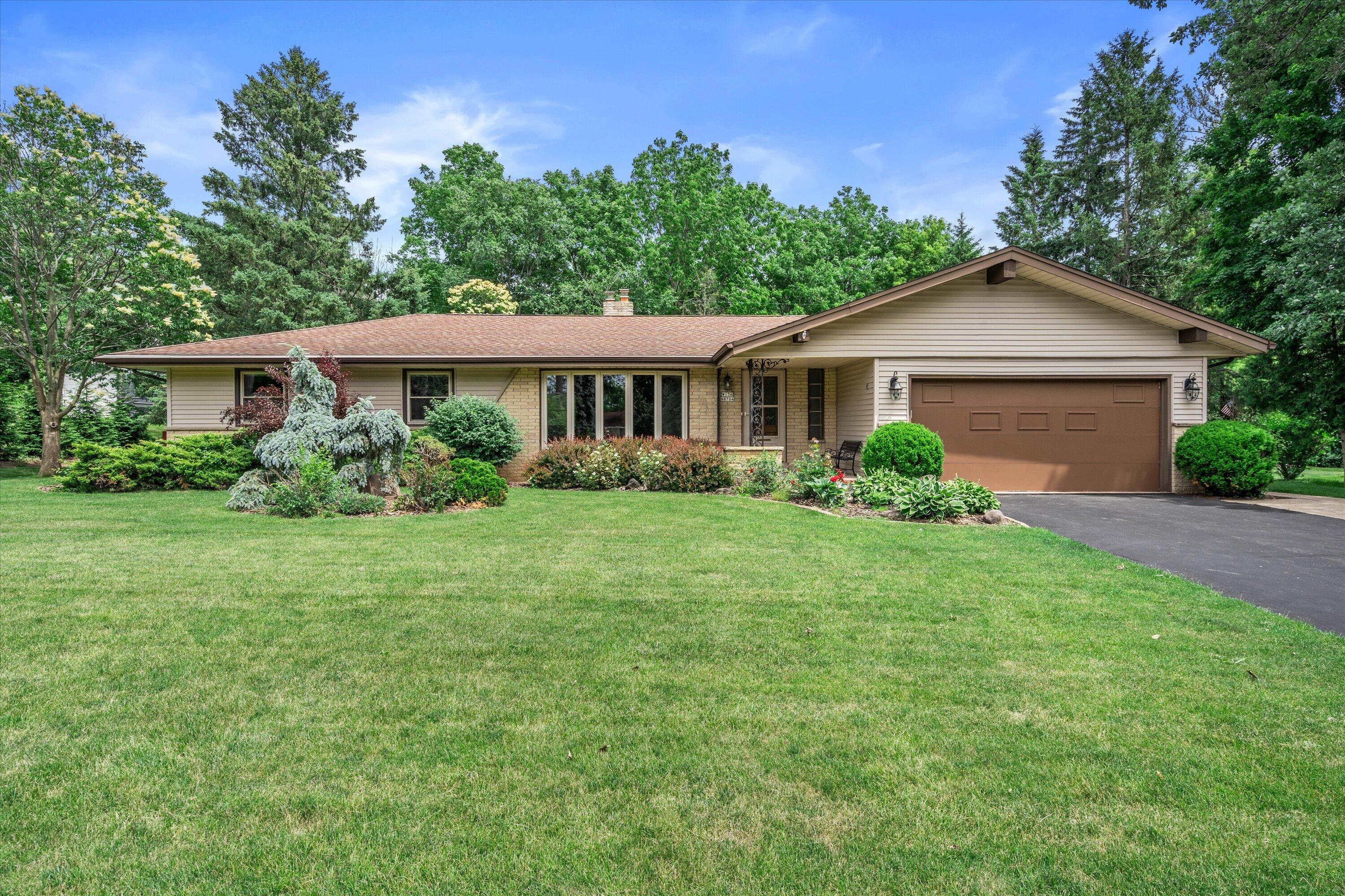 W136N8704 Esquire Road Menomonee Falls, WI 53051 - Photo 1 of 36 Front