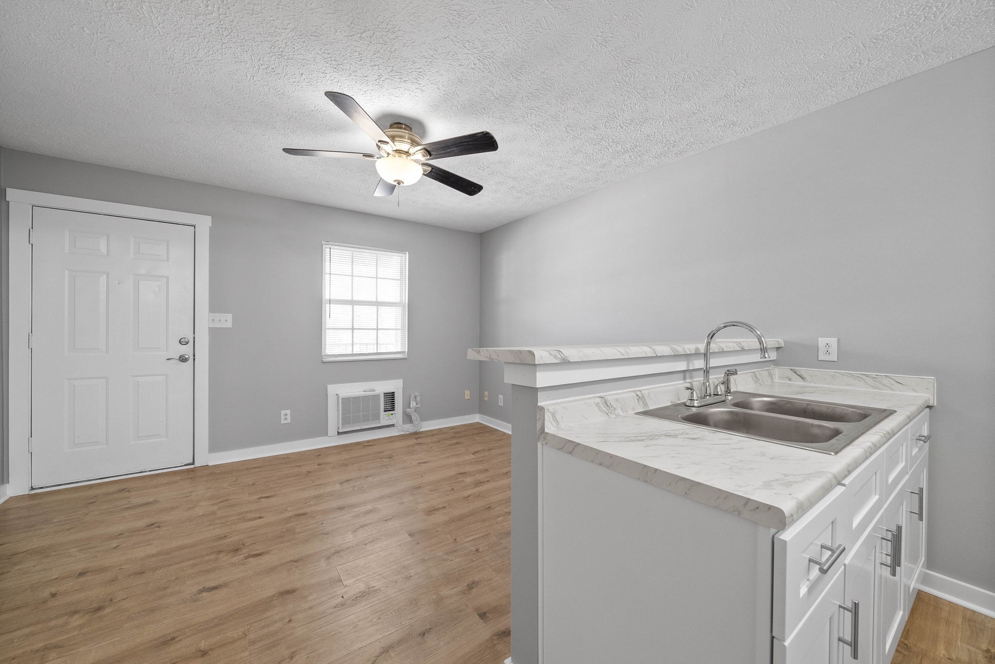 765 Robb Avenue, Unit 2 Clarksville, TN 37040 - Photo 13 of 24 a kitchen with a sink stove and cabinets