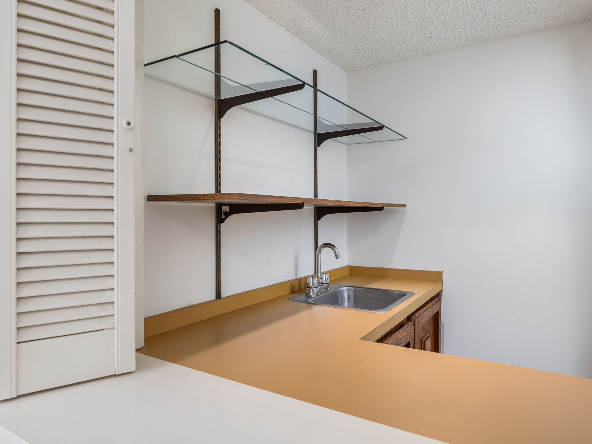 8216 Summer Side Drive Austin, TX 78759 - Photo 9 of 32 The wet bar