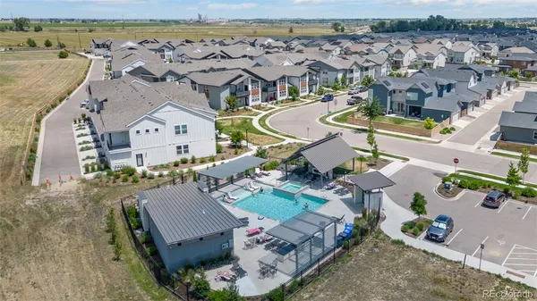 an aerial view of a house with a ocean view