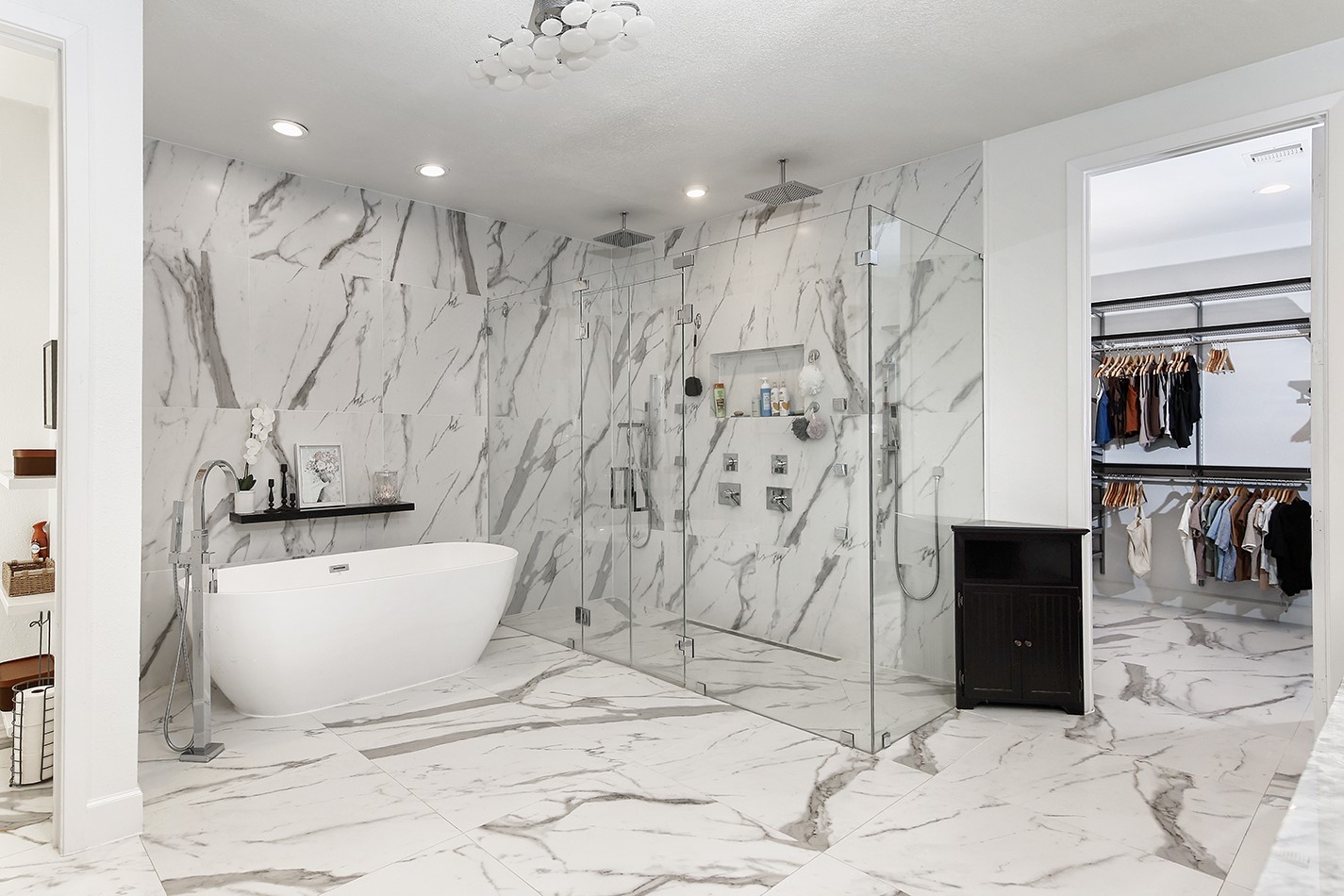 10 West Shady Lane Houston, TX 77063 - Photo 28 of 49 a bathroom with a bathtub and a shower