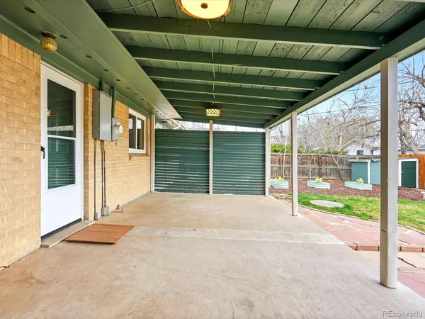 a view of backyard with porch