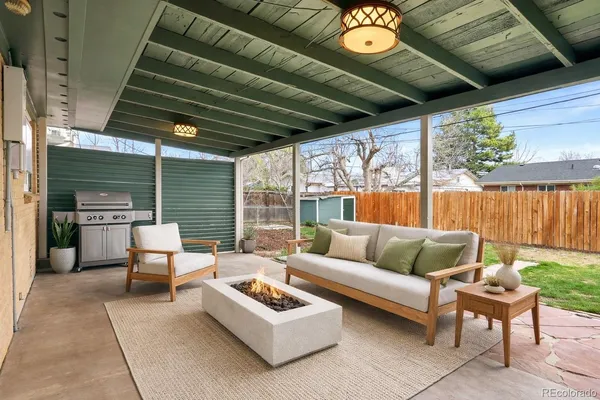 a outdoor space with patio the couches and a dining table with the garden view