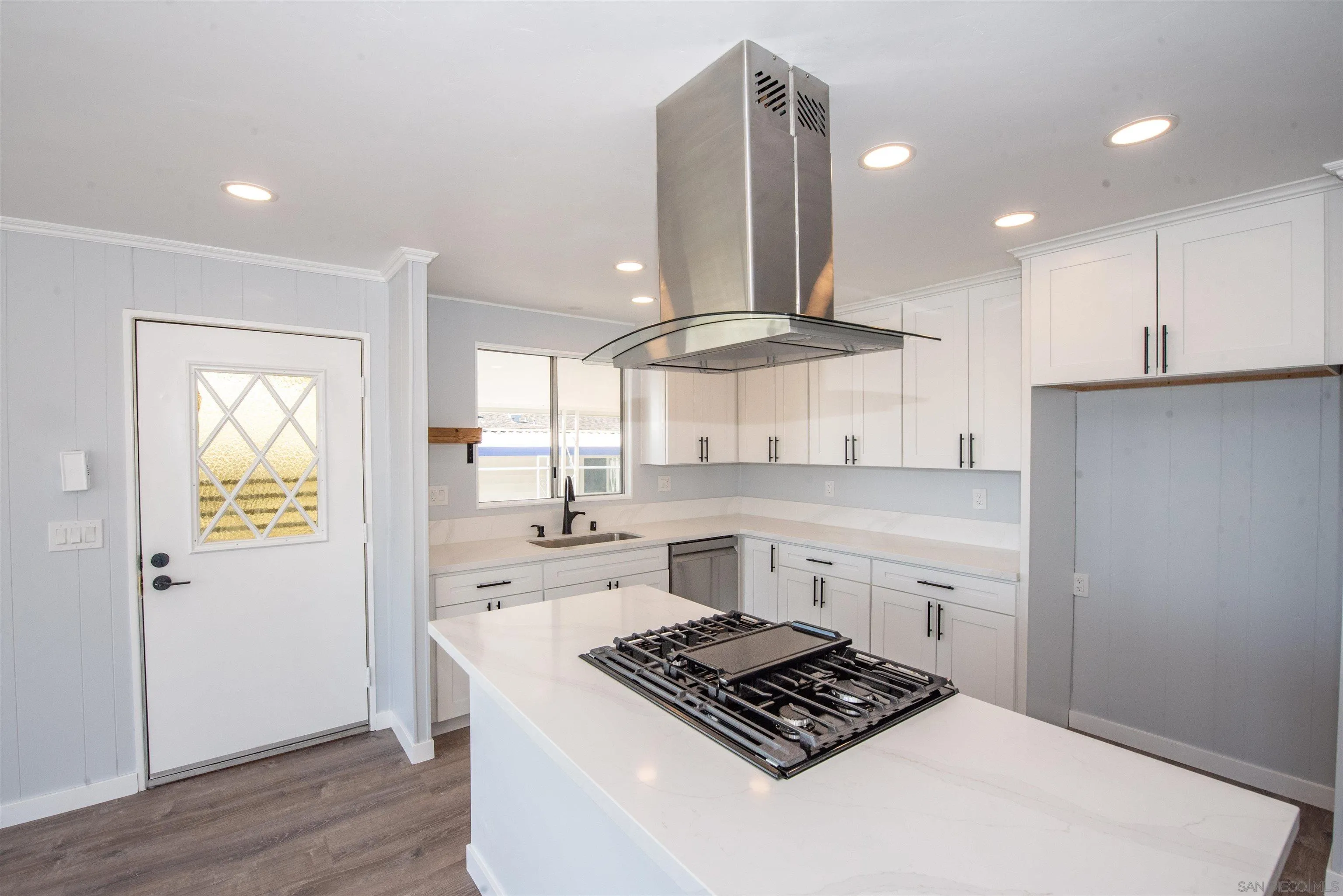 275 South Worthington Street, Unit 36 Spring Valley, CA 91977 - Photo 3 of 44 a kitchen with stainless steel appliances granite countertop a stove a sink and a refrigerator