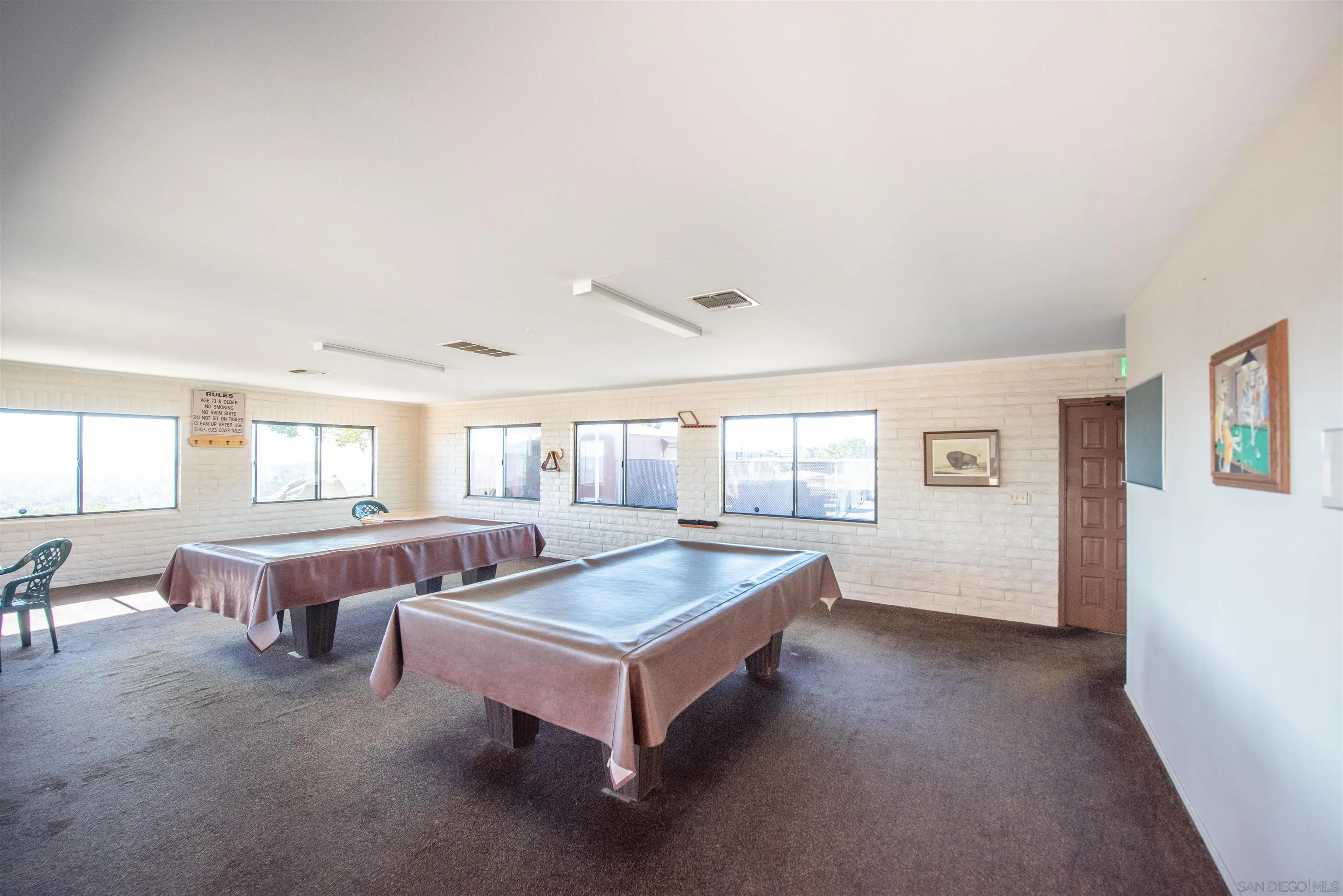 275 South Worthington Street, Unit 36 Spring Valley, CA 91977 - Photo 42 of 44 a living room with furniture pool table and windows