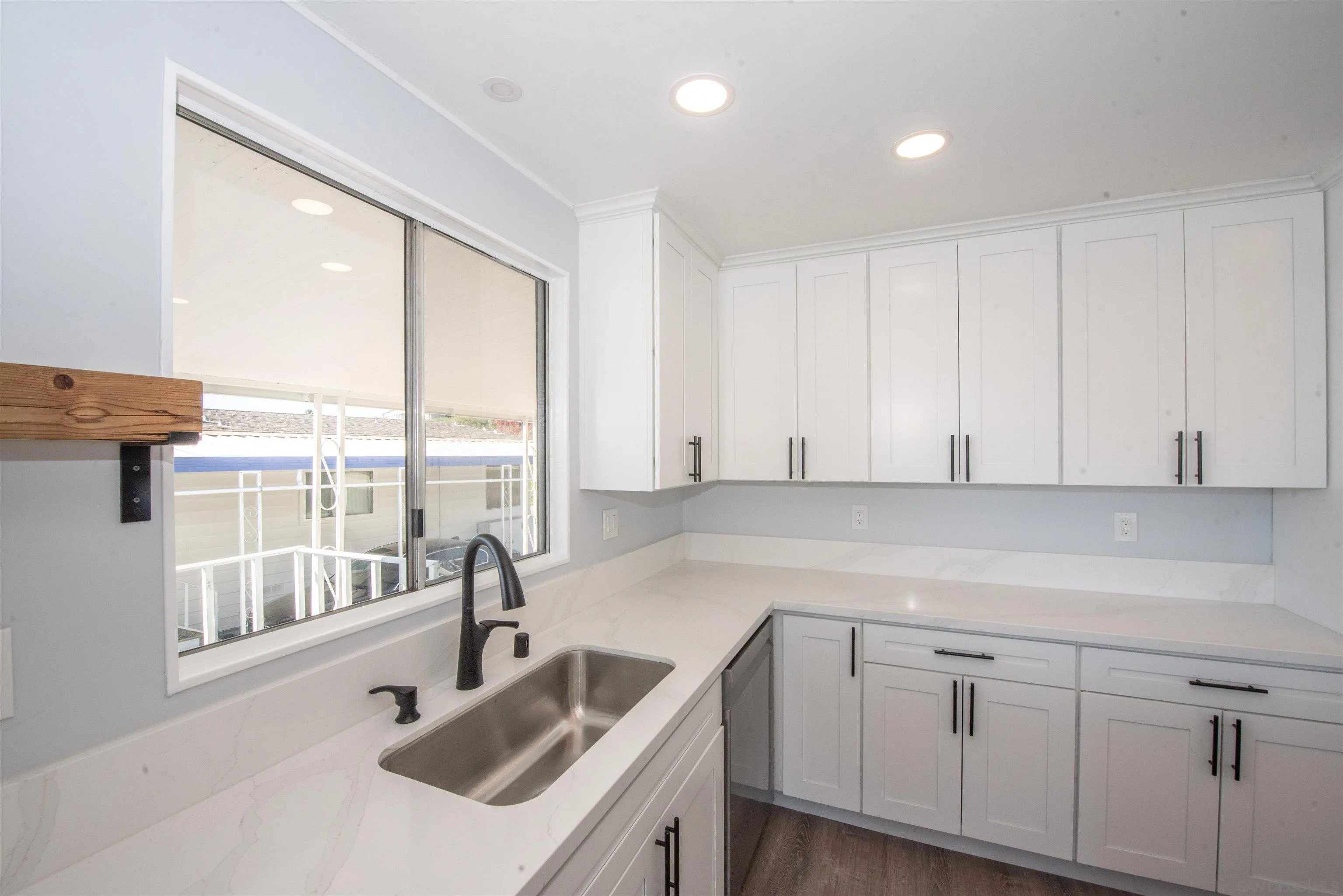 275 South Worthington Street, Unit 36 Spring Valley, CA 91977 - Photo 5 of 44 a kitchen with a sink and a window