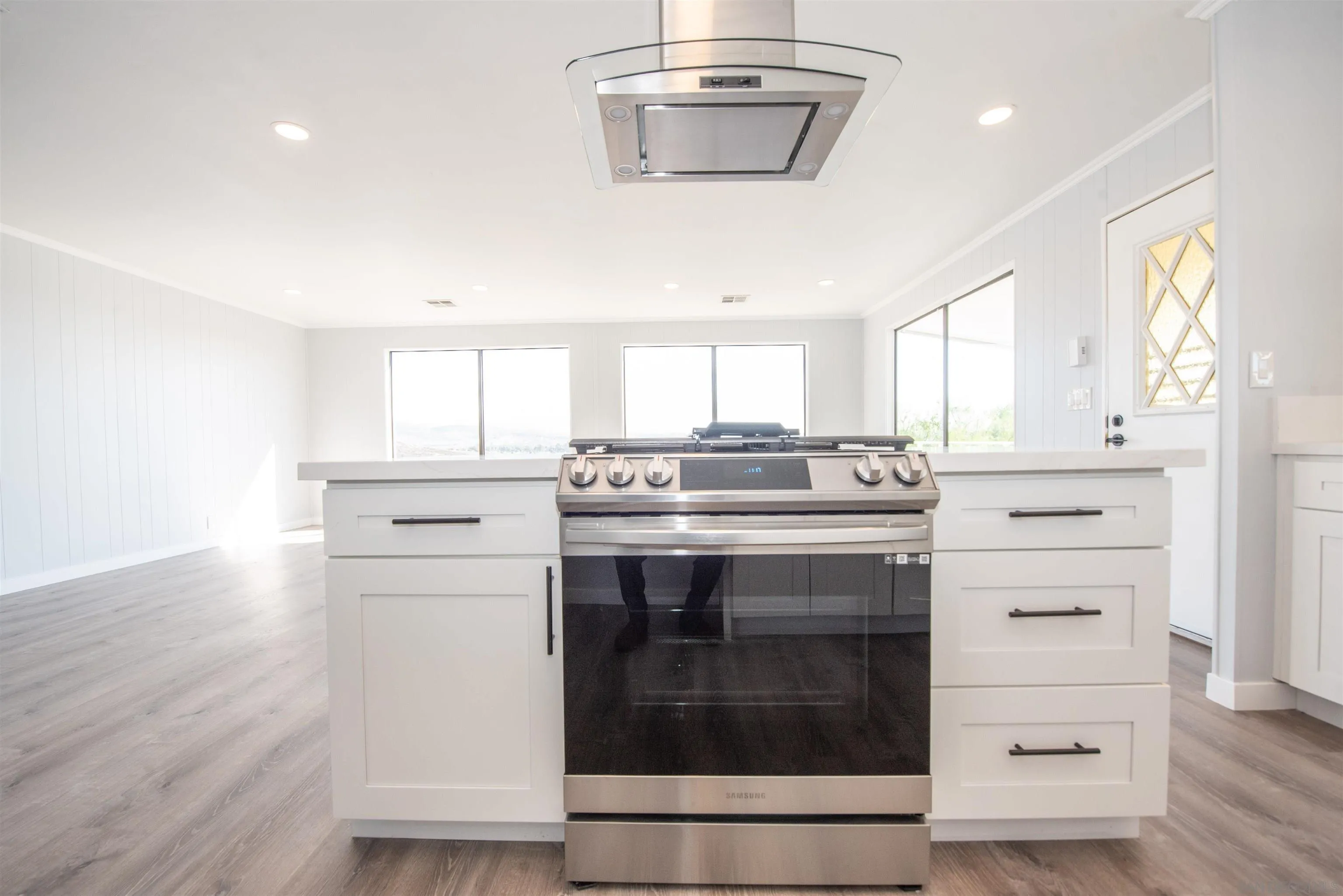 275 South Worthington Street, Unit 36 Spring Valley, CA 91977 - Photo 8 of 44 a kitchen with a stove and a refrigerator