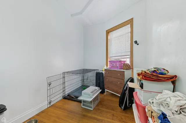 a room with furniture and a wooden floor