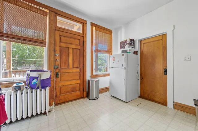 a view of a livingroom with furniture and windows