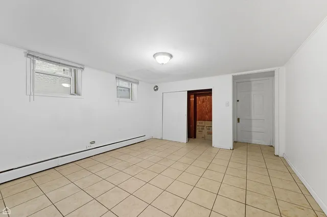 a view of an empty room and window