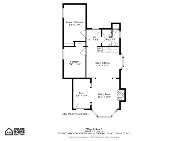 a picture of a next to a white wall