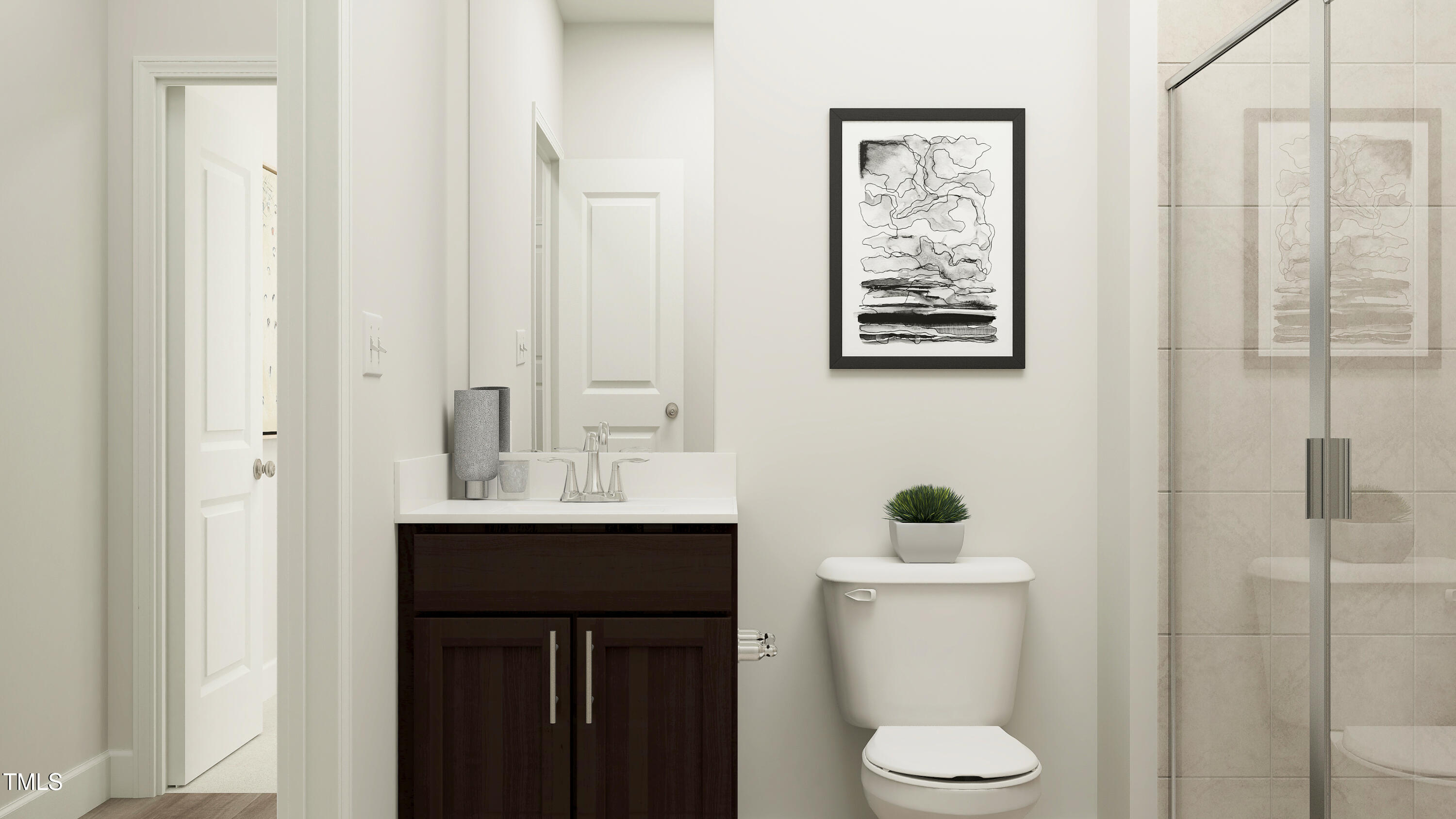 4325 Laurel Pond Way Raleigh, NC 27616 - Photo 10 of 26 a bathroom with a toilet sink and mirror