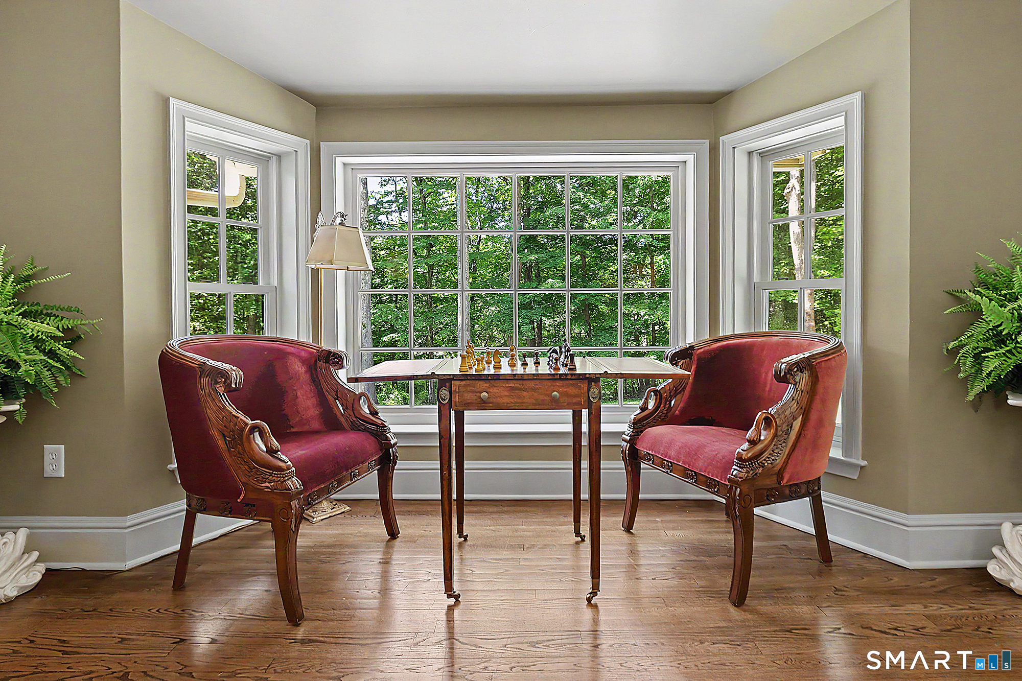 33 Hunter Lane Ridgefield, CT 06877 - Photo 12 of 39 a living room with furniture and a window