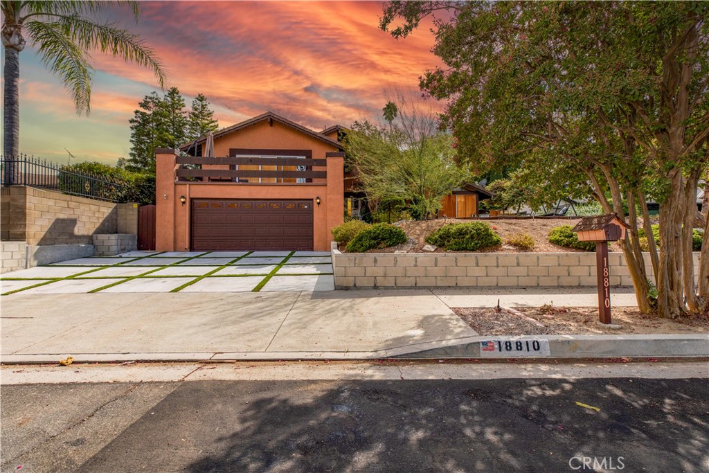 18810 Kirkcolm Lane Porter Ranch, CA 91326 - Photo 9 of 75 a view of a street with a building in the background