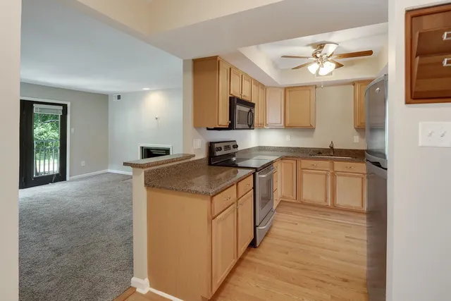 a view of balcony with wooden floor