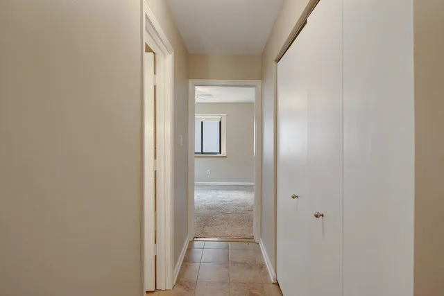 a view of an empty walk in closet