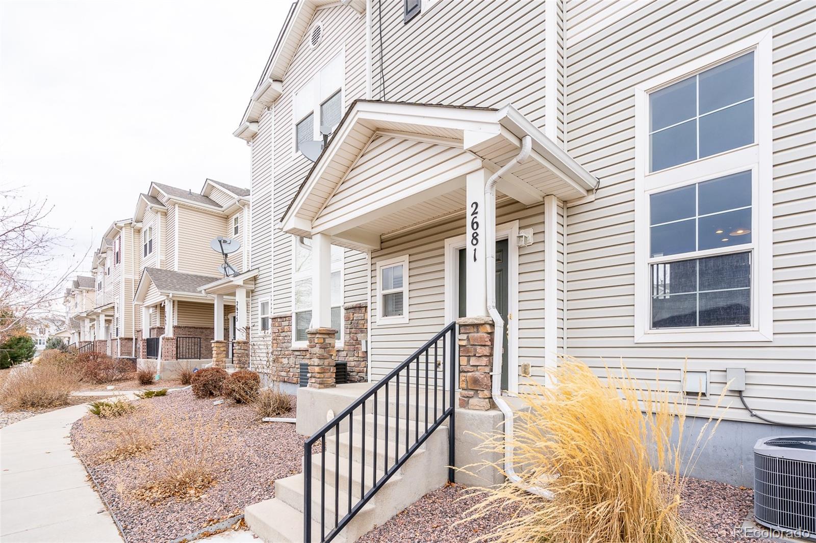 2681 Stonecrop Ridge Grove Colorado Springs, CO 80910 - Photo 4 of 26 a view of a house with a patio