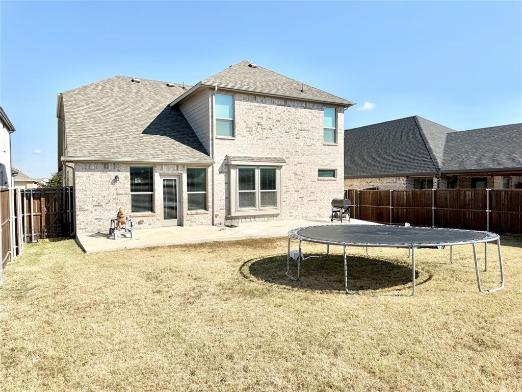 603 Hazeltine Road Red Oak, TX 75154 - Photo 37 of 37 a front view of a house with swimming pool