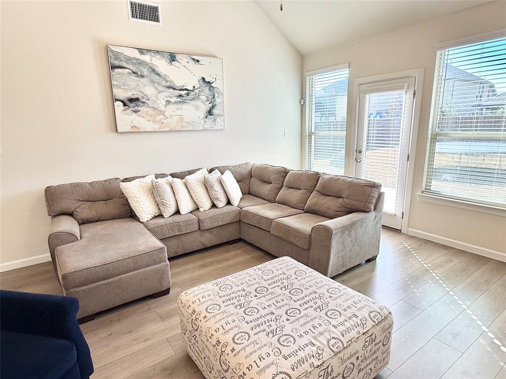 603 Hazeltine Road Red Oak, TX 75154 - Photo 6 of 37 a living room with furniture and a couch