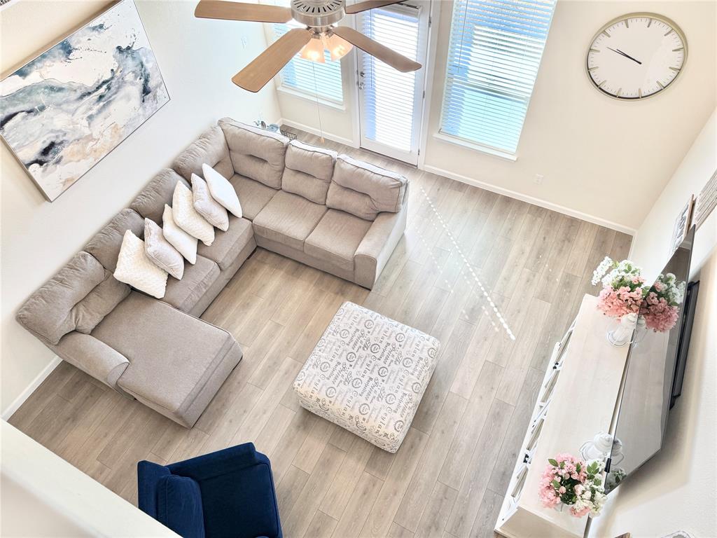 603 Hazeltine Road Red Oak, TX 75154 - Photo 7 of 37 a living room with furniture and a large window