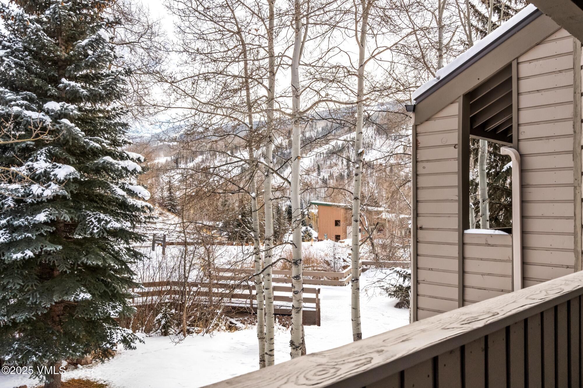 945 Red Sandstone Road, Unit A5 Vail, CO 81657 - Photo 16 of 38 a view of residential house with a tree