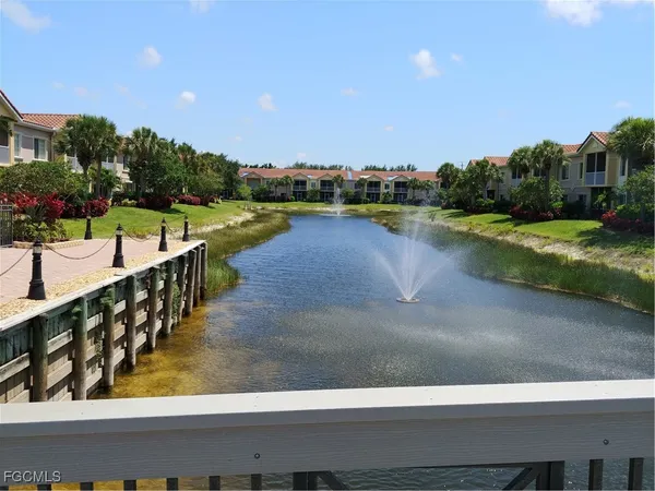 a view of swimming pool from a balcony