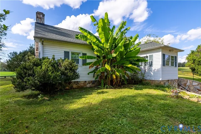 a view of a swimming pool with mountains in the background