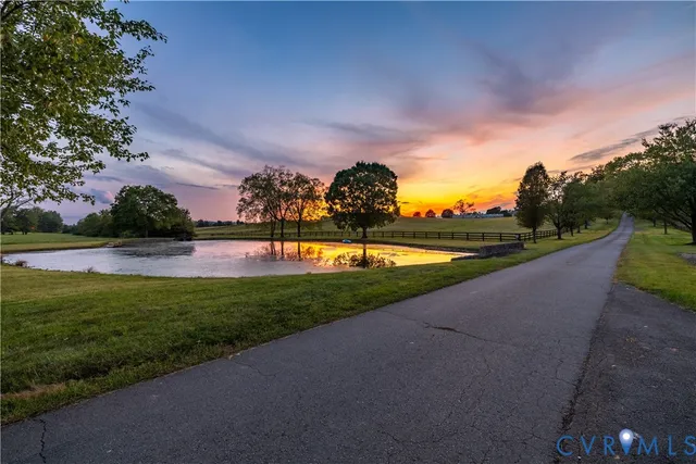 a view of a lake with a yard