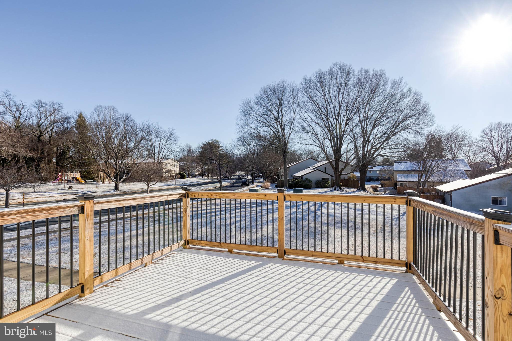 1615 Fendall Court Crofton, MD 21114 - Photo 16 of 16 a view of a wooden roof deck