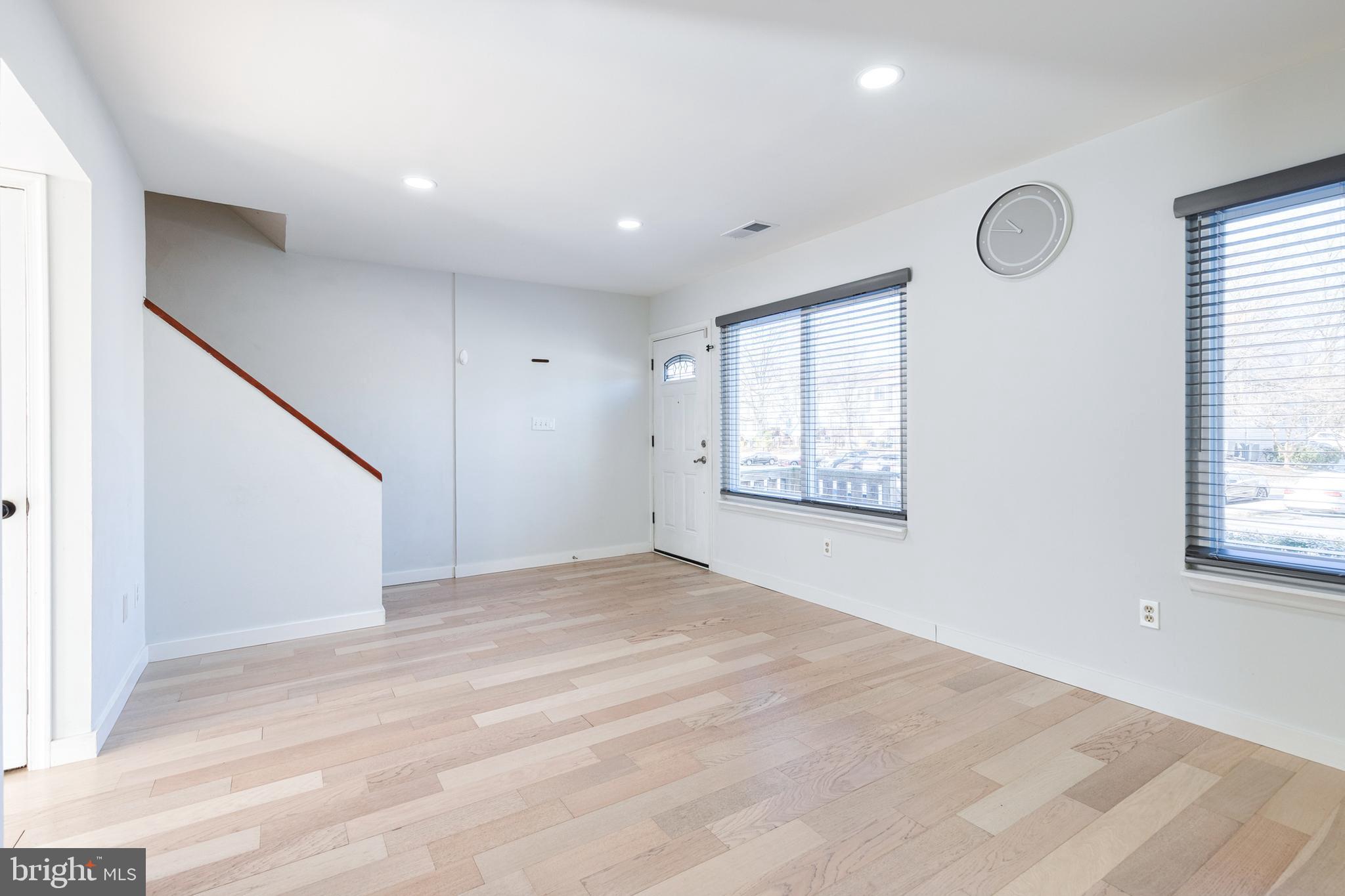 1615 Fendall Court Crofton, MD 21114 - Photo 3 of 16 a view of an empty room with a window