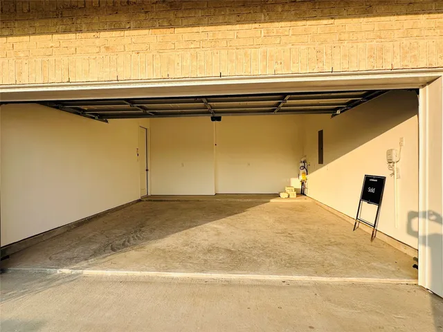 a view of a bathroom with wooden floor