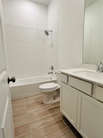 an empty room with a empty space and windows