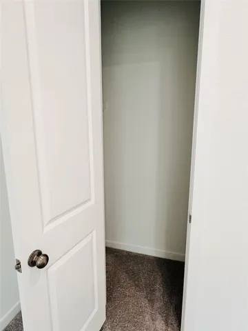 a bathroom with a toilet and a sink