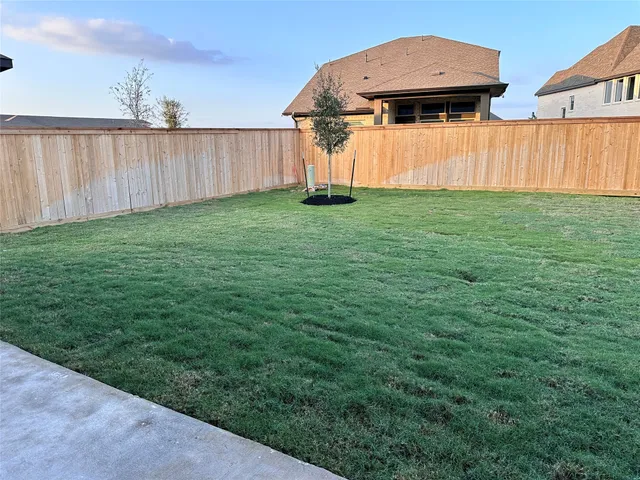 a house view with a garden space