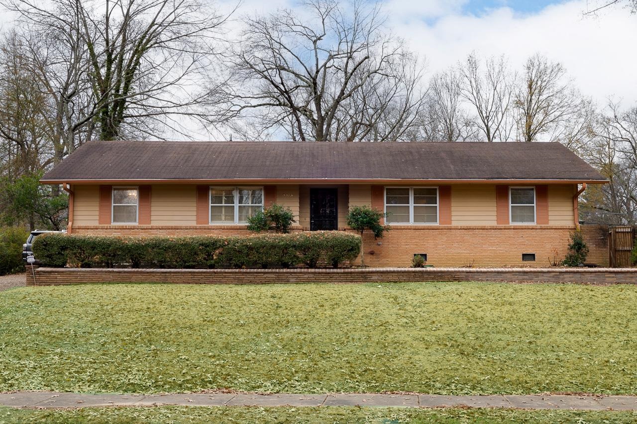 5673 Normandy Road Memphis, TN 38120 - Photo 1 of 39 a front view of a house with a yard
