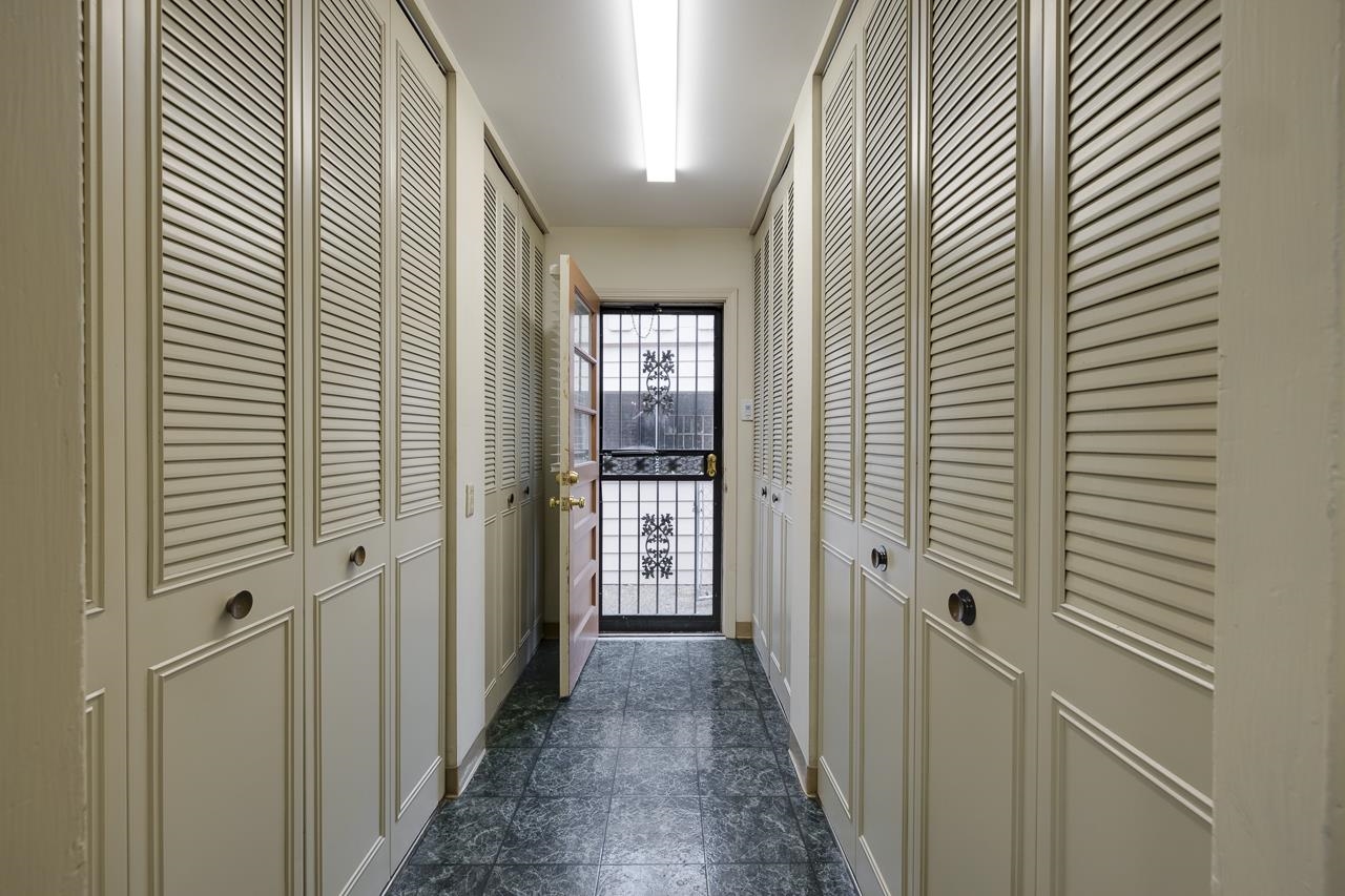 5673 Normandy Road Memphis, TN 38120 - Photo 16 of 39 a view of a hallway with a white walls