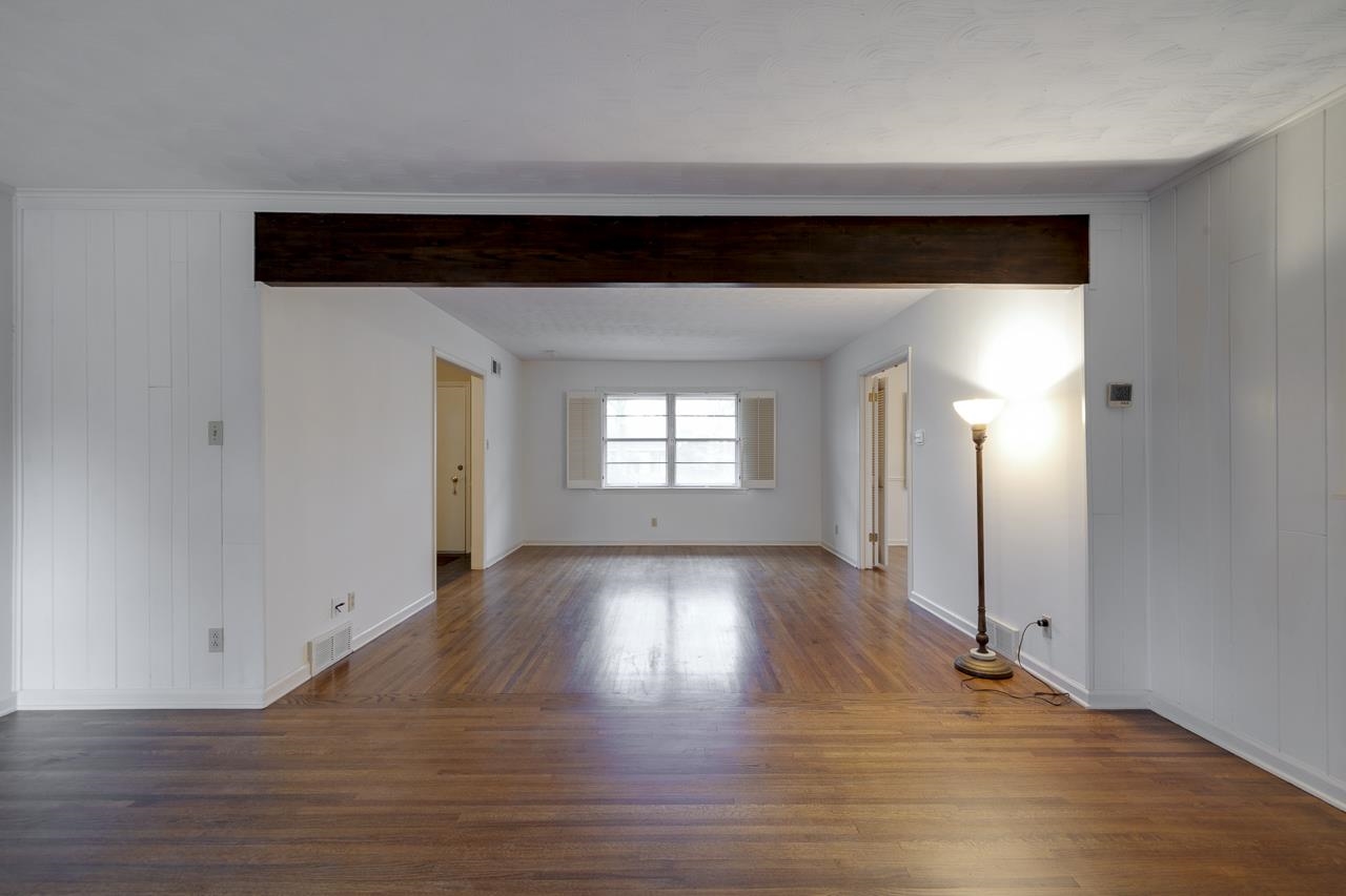 5673 Normandy Road Memphis, TN 38120 - Photo 8 of 39 a living room with wooden floor