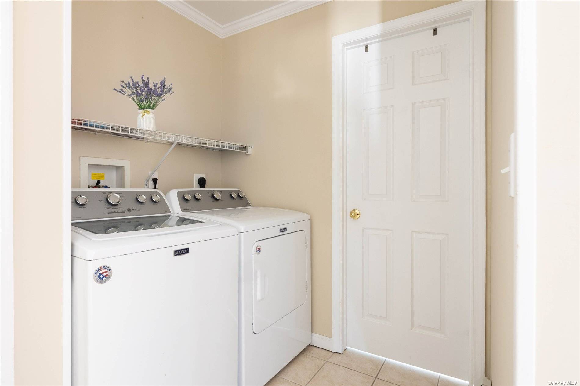 115 Cliff Road Wading River, NY 11792 - Photo 12 of 28 a kitchen with a sink and cabinets
