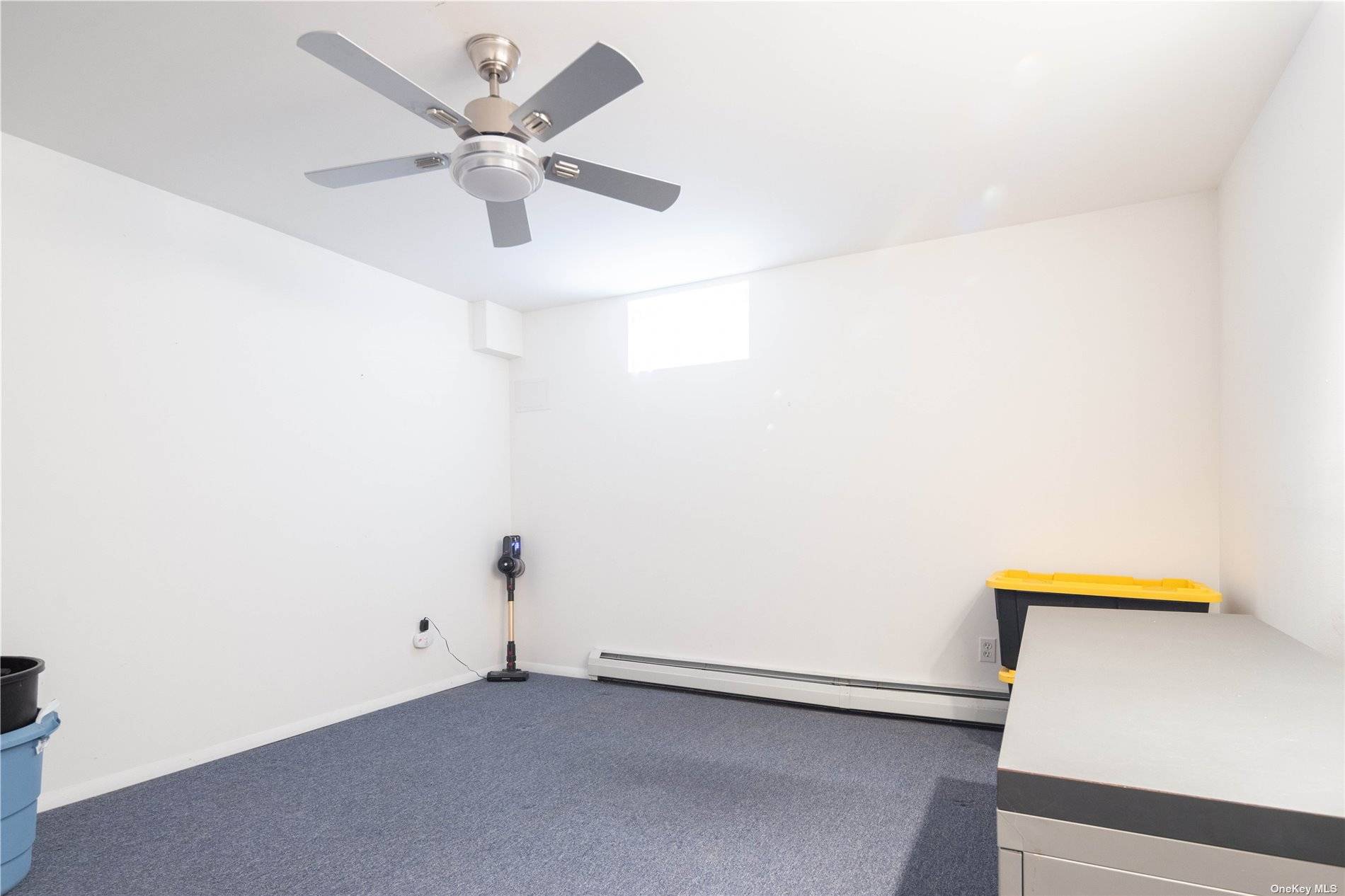 115 Cliff Road Wading River, NY 11792 - Photo 20 of 28 a view of an empty room