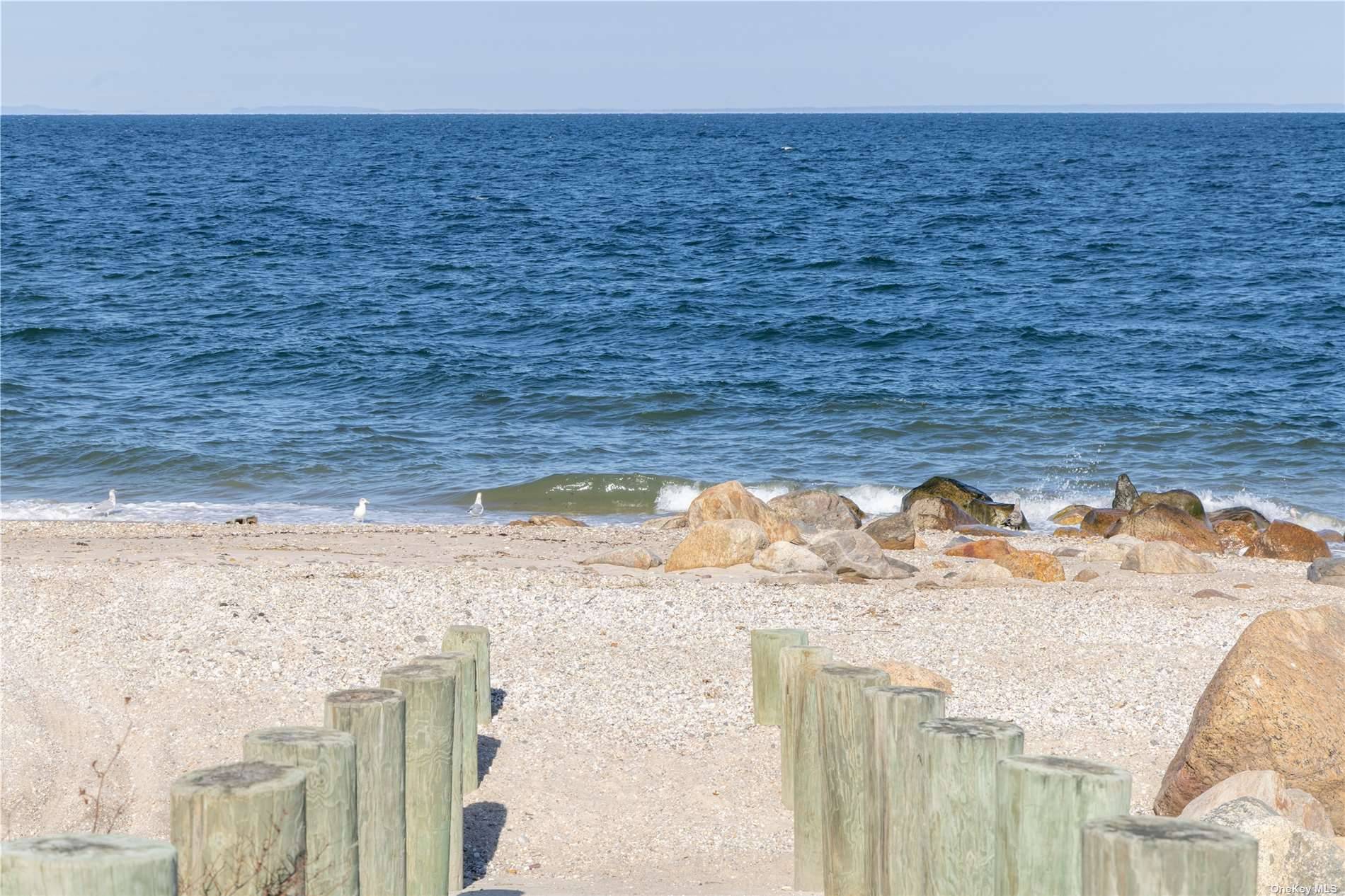 115 Cliff Road Wading River, NY 11792 - Photo 26 of 28 a bathroom with a sink
