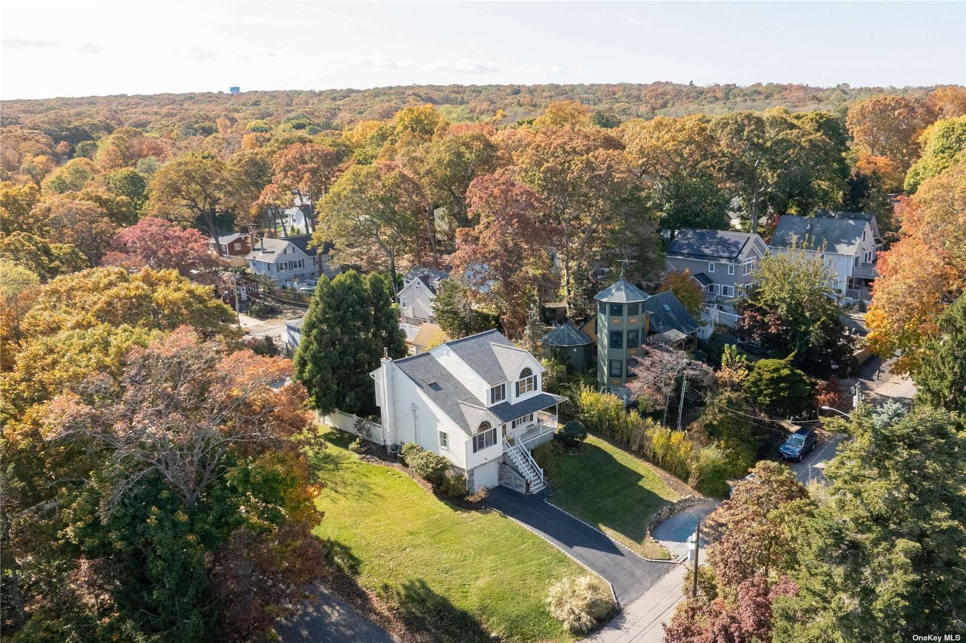 115 Cliff Road Wading River, NY 11792 - Photo 3 of 28 an aerial view of a house with a yard