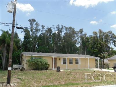 18453 Iris Road Fort Myers, FL 33967 - Photo 1 of 10 a view of a house with a backyard