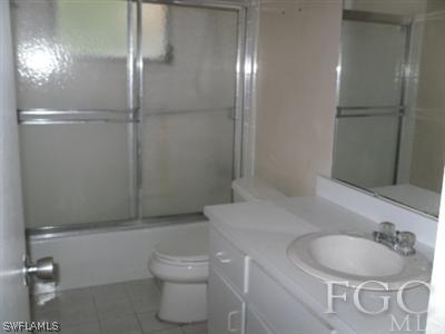 18453 Iris Road Fort Myers, FL 33967 - Photo 6 of 10 a bathroom with a sink and a toilet